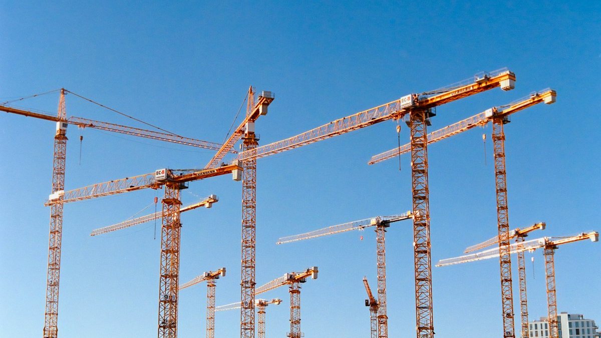 Industrial yard mobile crane operations with chain slings and hoists — OM Enterprise